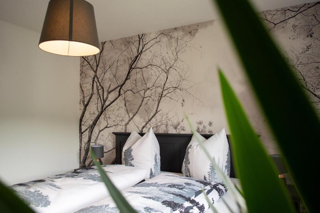 Postel nebo postele na pokoji v ubytování Ferienwohnung Kurz "Weinbergblick"