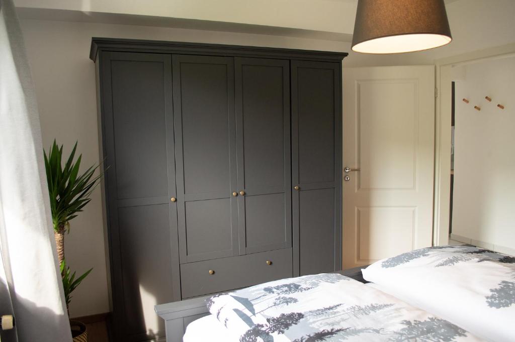 Postel nebo postele na pokoji v ubytování Ferienwohnung Kurz "Weinbergblick"