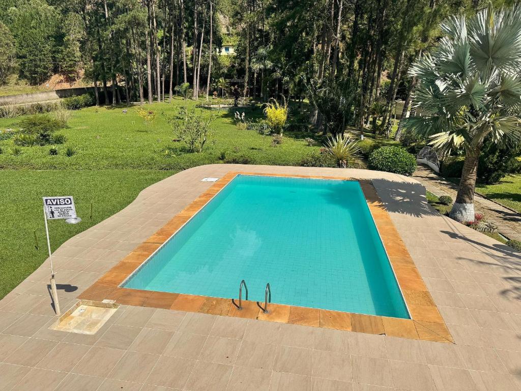 Πισίνα στο ή κοντά στο Sítio Exclusivo com Área Gourmet, Piscina e Natureza