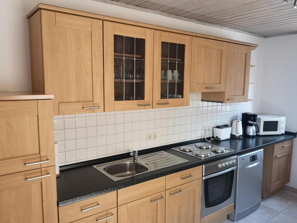 Kuchyň nebo kuchyňský kout v ubytování Ferienwohnung-Kappl