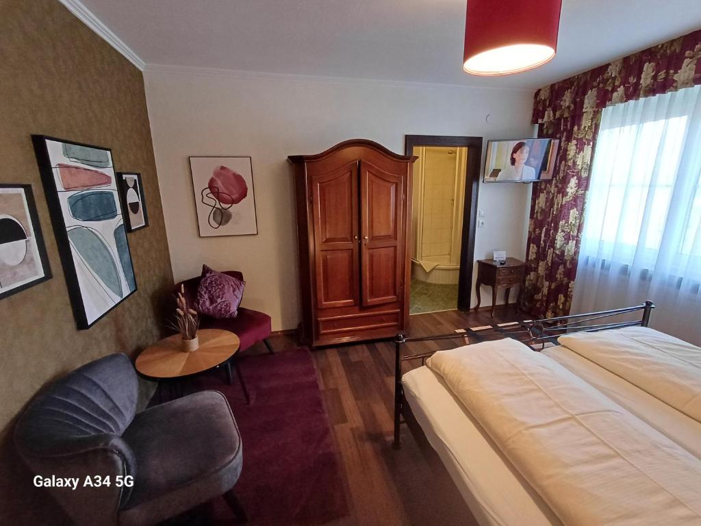 Posteľ alebo postele v izbe v ubytovaní Haus am Moos
