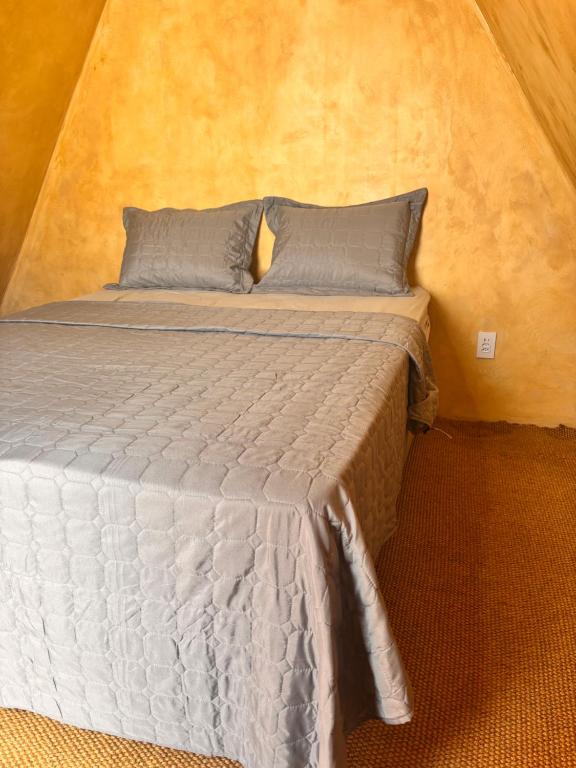 Postel nebo postele na pokoji v ubytování Chalé Beach Paradise em Itacaré
