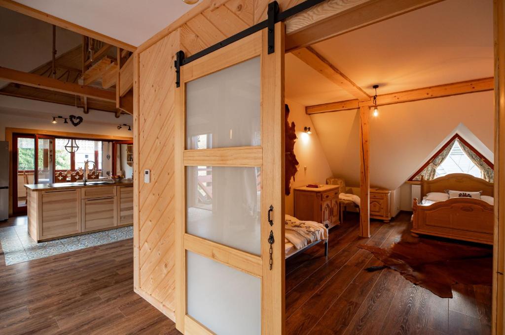Postel nebo postele na pokoji v ubytování Apartament Górski u Papierzy Sauna, Jacuzzi, SPA