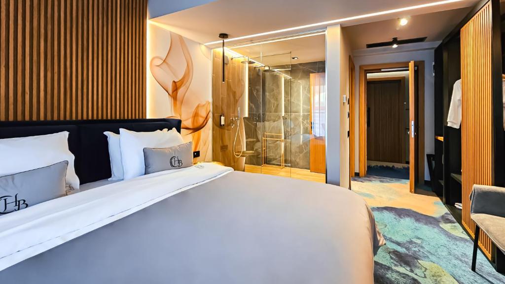 Postel nebo postele na pokoji v ubytování Hotel Bucura