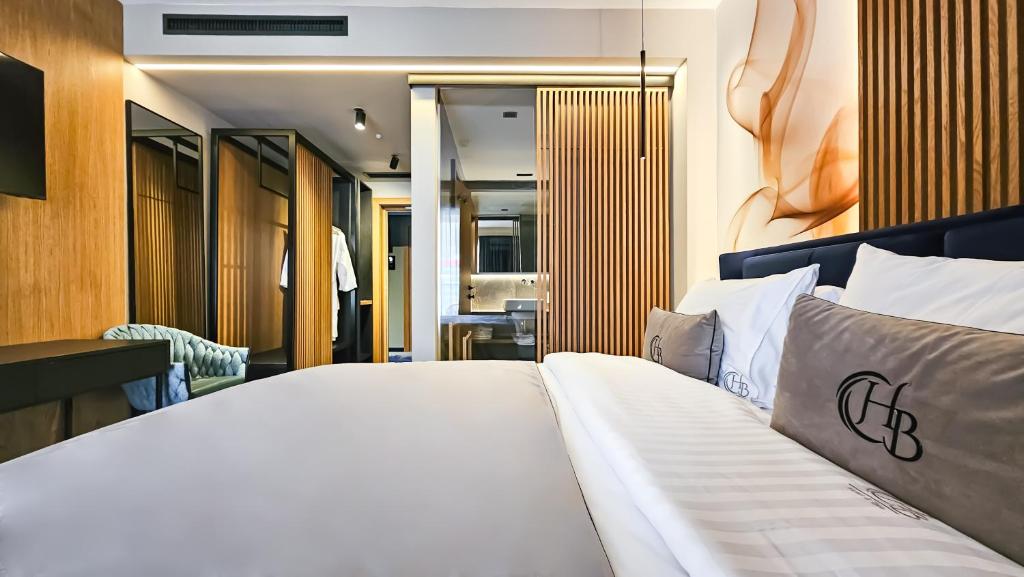 Postel nebo postele na pokoji v ubytování Hotel Bucura
