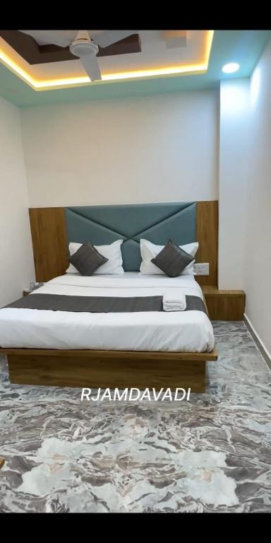 Postel nebo postele na pokoji v ubytování Hotel Sunrise Rooms