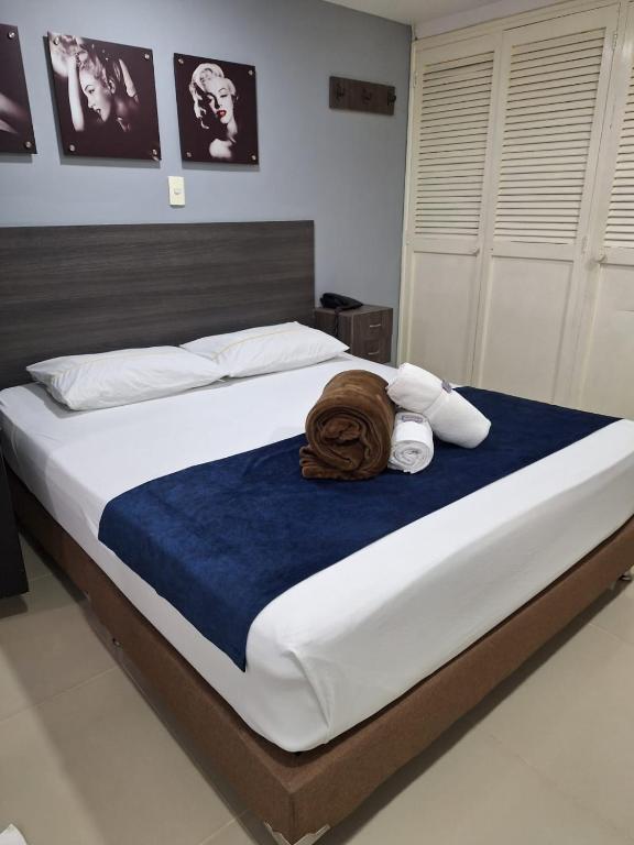 Postel nebo postele na pokoji v ubytování Hotel Suramericana