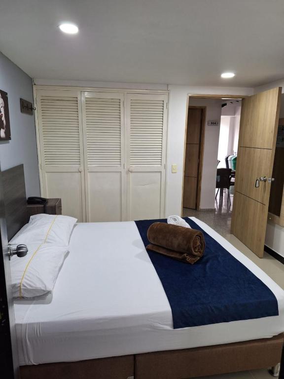 Postel nebo postele na pokoji v ubytování Hotel Suramericana
