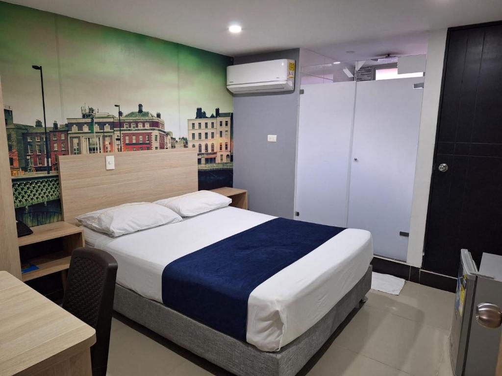 Postel nebo postele na pokoji v ubytování Hotel Suramericana