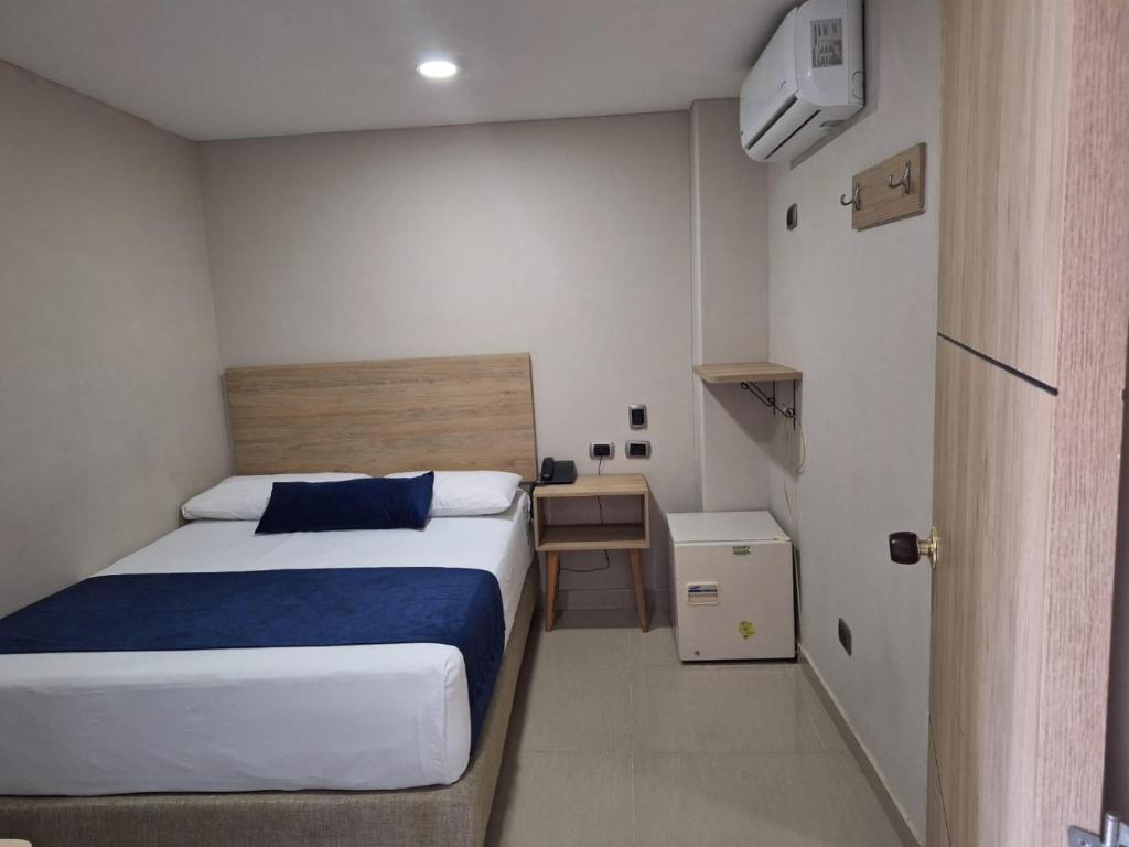 Postel nebo postele na pokoji v ubytování Hotel Suramericana