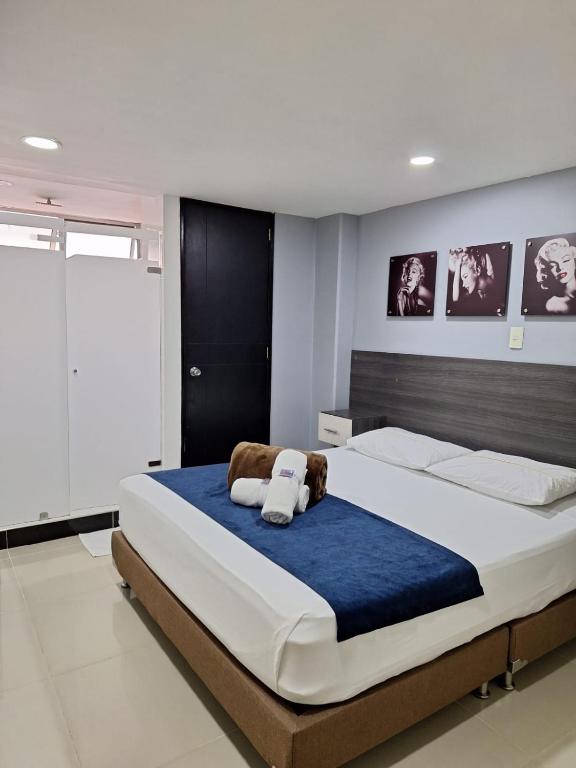 Postel nebo postele na pokoji v ubytování Hotel Suramericana