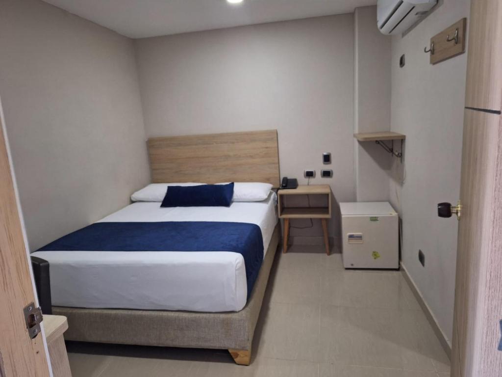 Postel nebo postele na pokoji v ubytování Hotel Suramericana