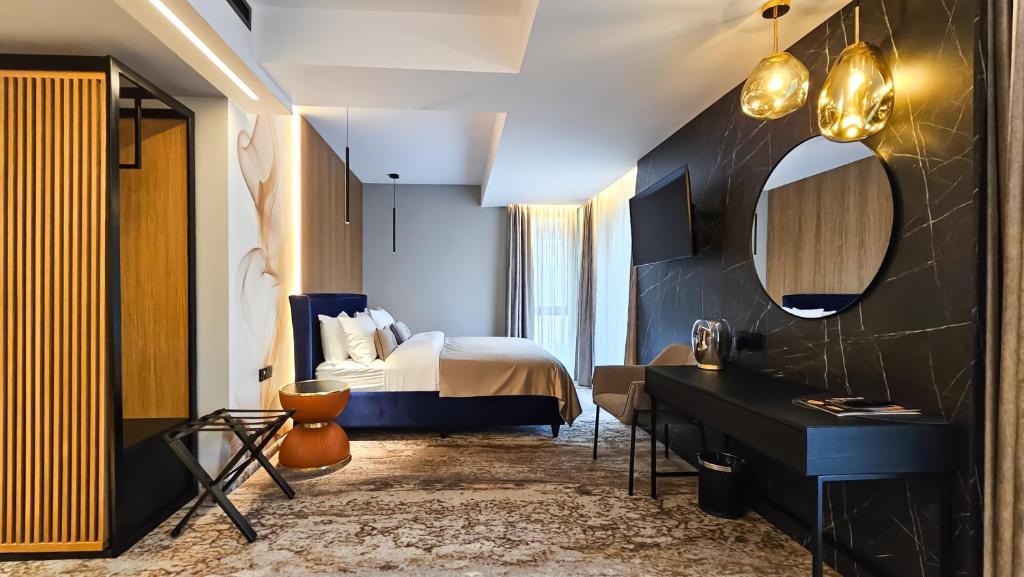 Postel nebo postele na pokoji v ubytování Hotel Bucura