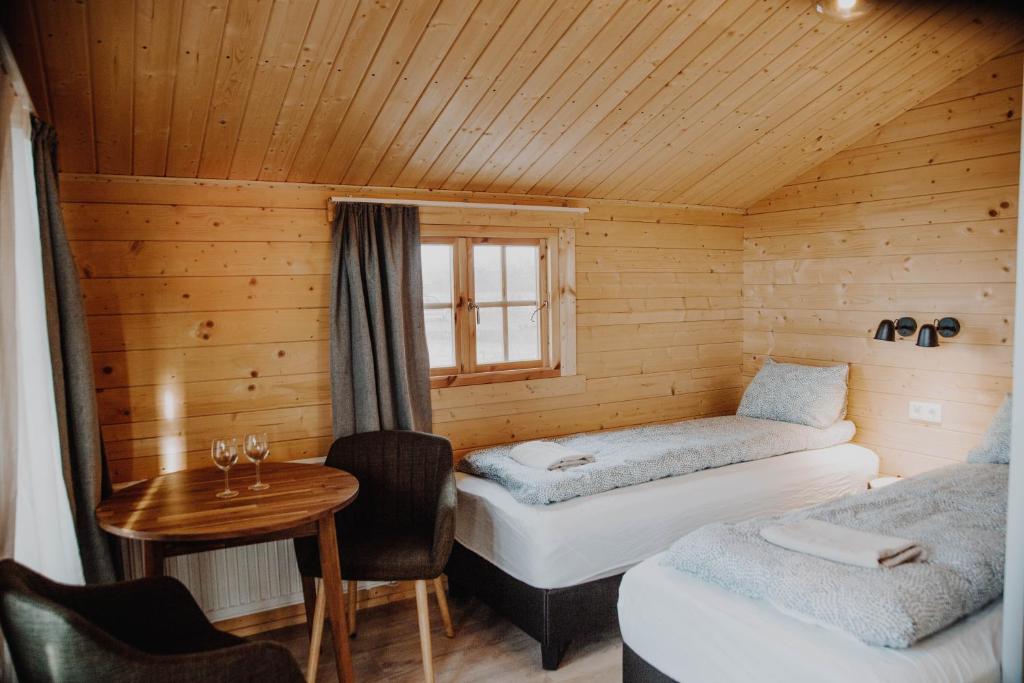 Postel nebo postele na pokoji v ubytování Rauðuskriður