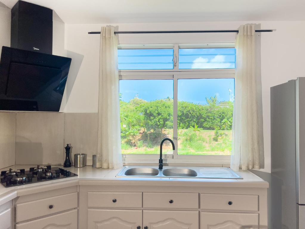 Kuchyň nebo kuchyňský kout v ubytování Promo Vacances 2025 ! Domaine Nature & Sérénité à 5 min de la plage