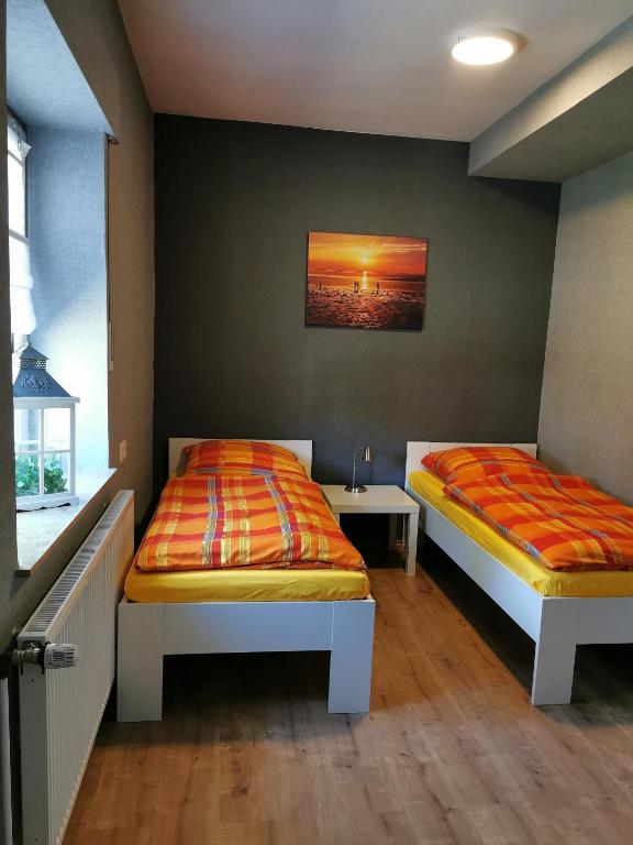 Postel nebo postele na pokoji v ubytování Ferienwohnung Lena in LathenEmsland