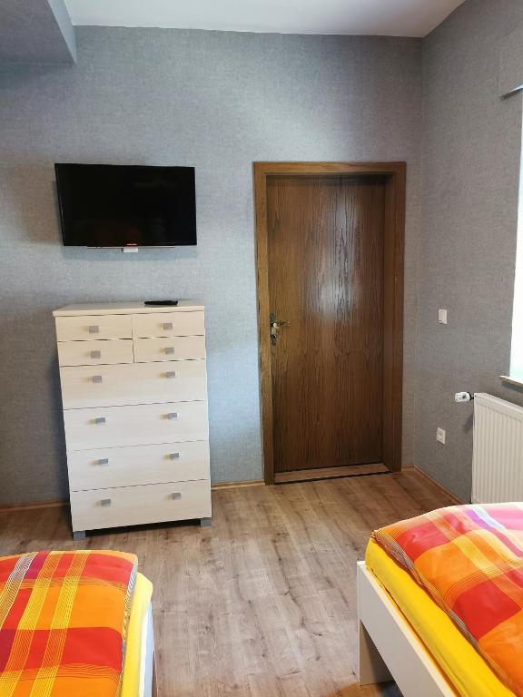 Postel nebo postele na pokoji v ubytování Ferienwohnung Lena in LathenEmsland