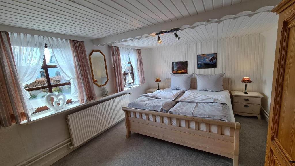 Ένα ή περισσότερα κρεβάτια σε δωμάτιο στο Appartement Nr 27