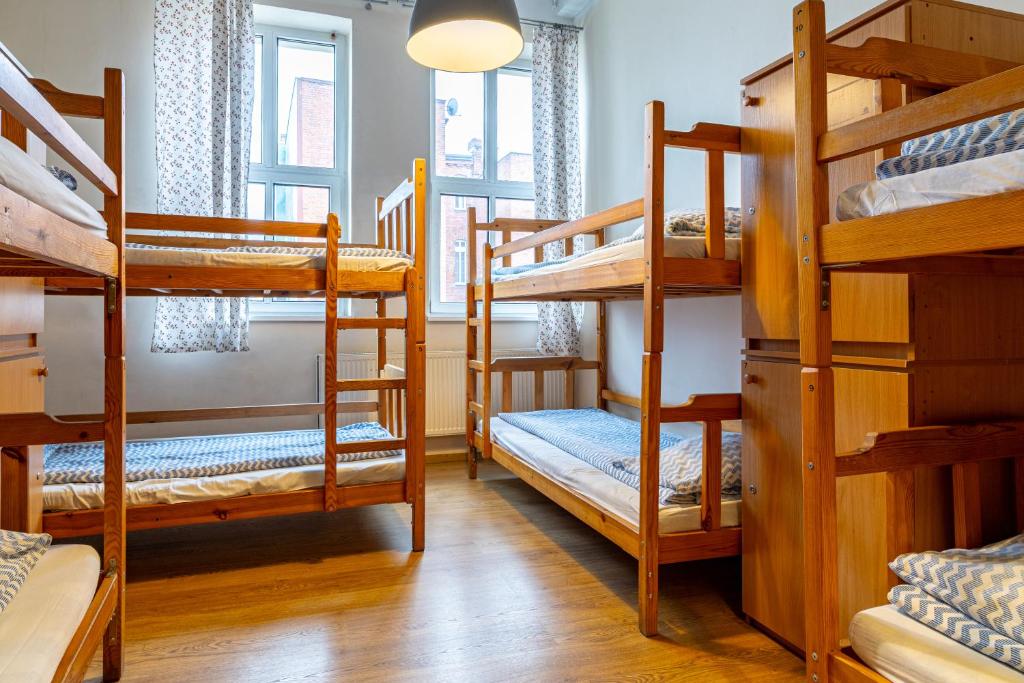 Postel nebo postele na pokoji v ubytování Hostel Orange Plus