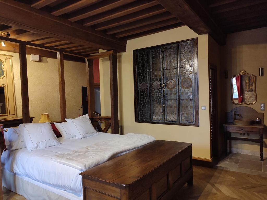Postel nebo postele na pokoji v ubytování Gite, chambre d hôte L échoppe est belle