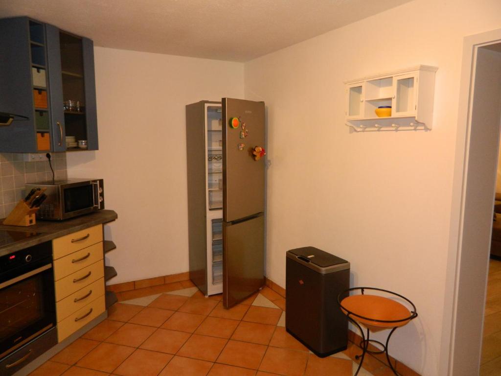 Kuchyň nebo kuchyňský kout v ubytování Helle Komfortwohnung