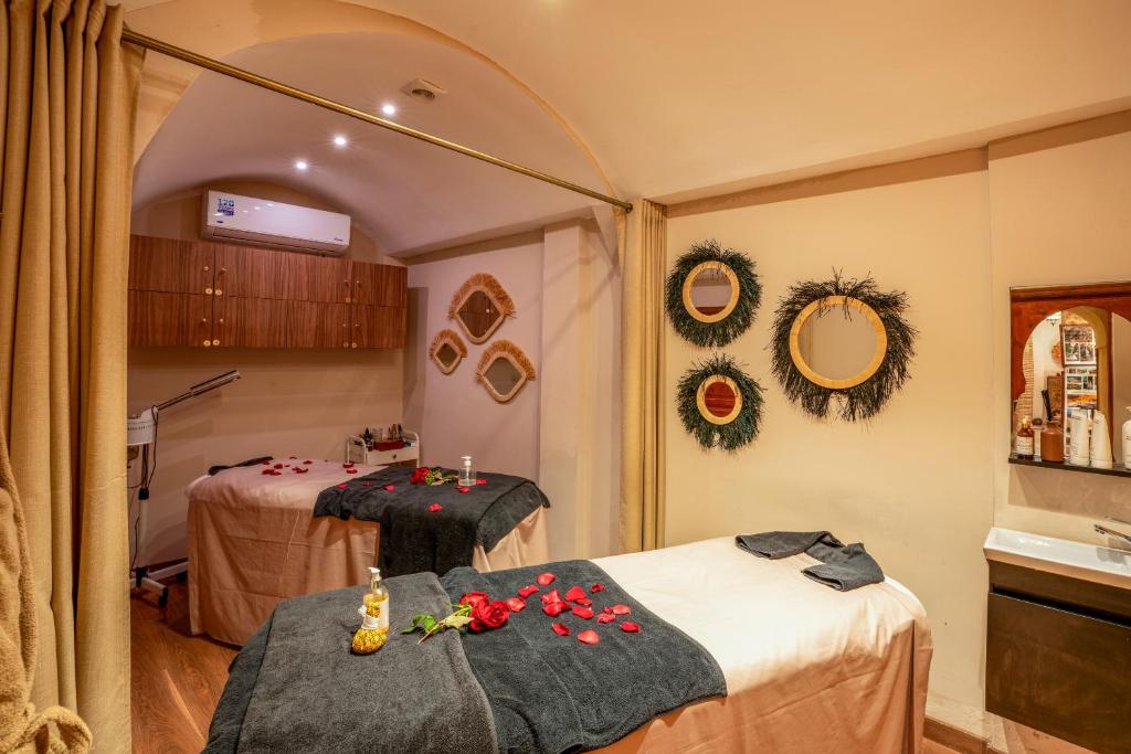 Postel nebo postele na pokoji v ubytování Riad Janate & SPA