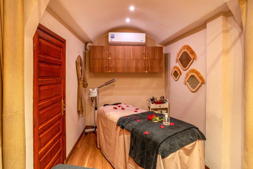 Postel nebo postele na pokoji v ubytování Riad Janate & SPA