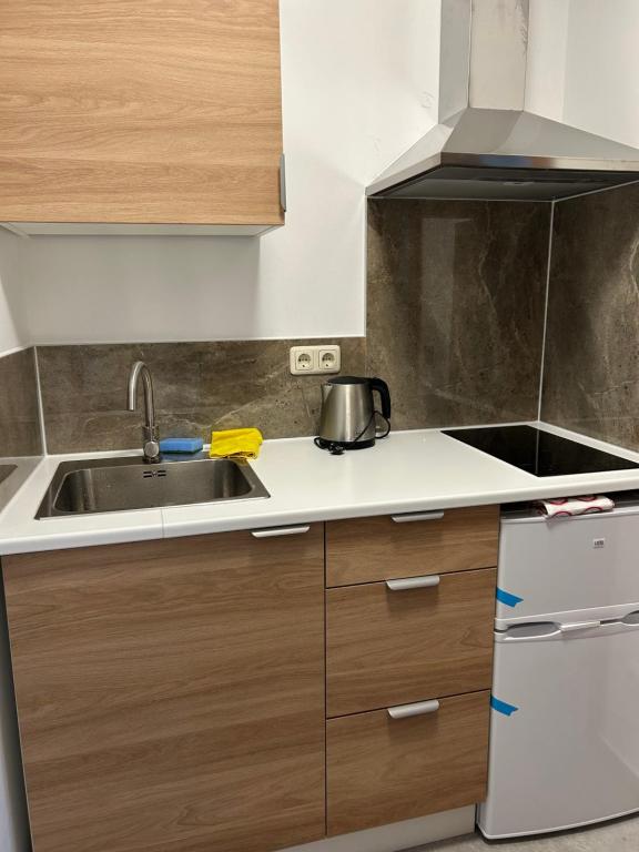 Kuchyň nebo kuchyňský kout v ubytování Chambre double chez Zhang