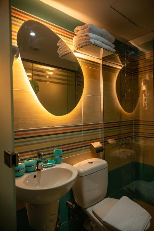Koupelna v ubytování Soft Hotel