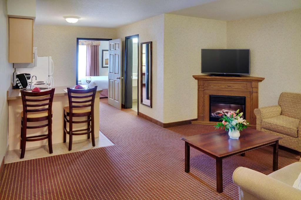 TV a/nebo společenská místnost v ubytování Coast Grimshaw Hotel & Suites