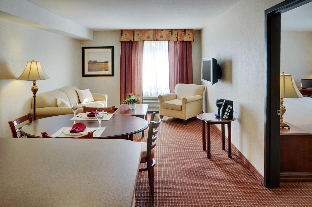 TV a/nebo společenská místnost v ubytování Coast Grimshaw Hotel & Suites