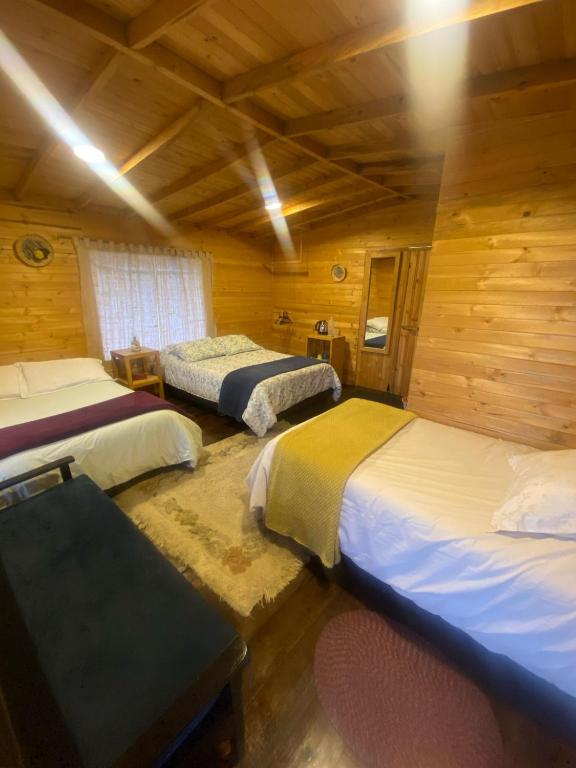 Cama o camas de una habitación en Serás Libre Refugio