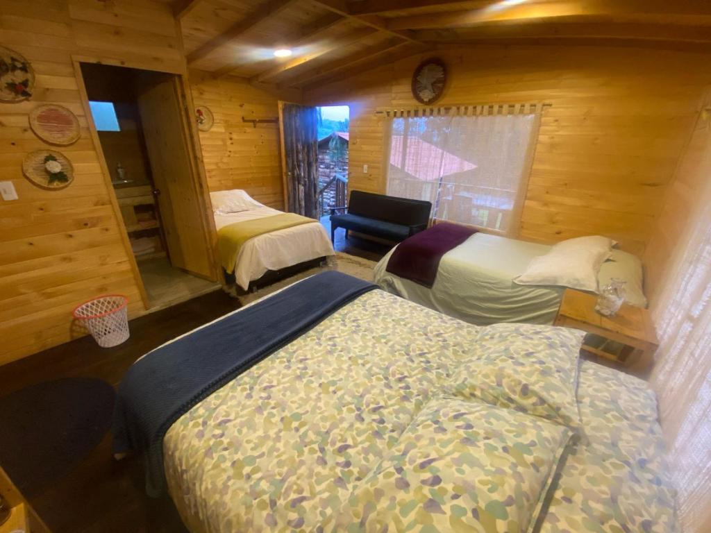 Cama o camas de una habitación en Serás Libre Refugio