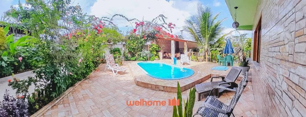 Swimmingpoolen hos eller tæt på Casa em Ilheus com Piscina Próxima a Praia