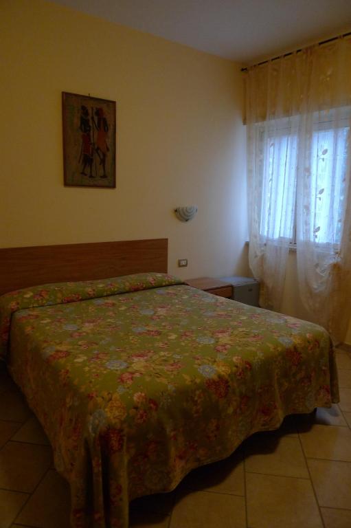 Postel nebo postele na pokoji v ubytování Pensione Campese