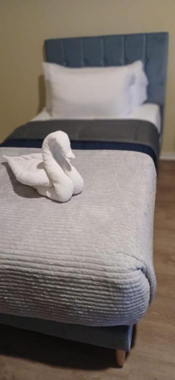Voodi või voodid majutusasutuse Sky's Villa Resort toas