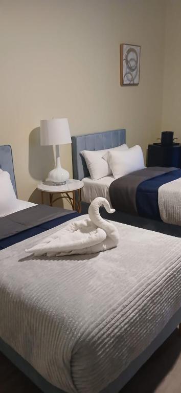 Voodi või voodid majutusasutuse Sky's Villa Resort toas