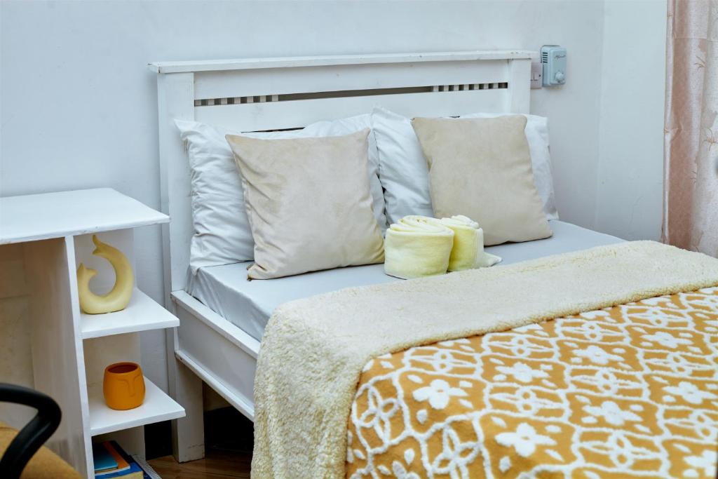Cama o camas de una habitación en Tarona peaceful homes - 1br apartment in Mtwara