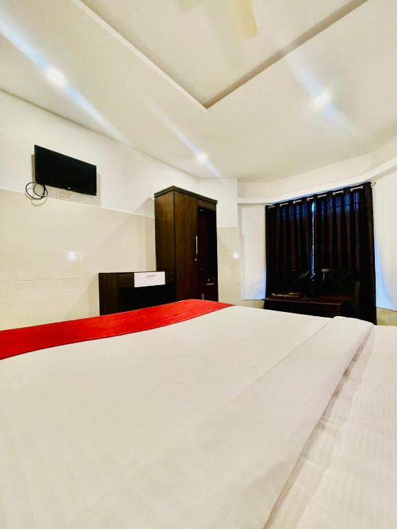 Postel nebo postele na pokoji v ubytování Skylark Holidays Munnar