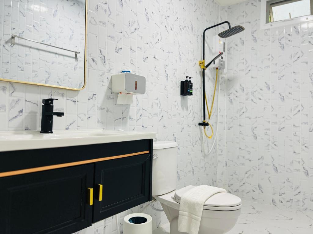 Koupelna v ubytování สวนปาล์มการ์เด้นโฮม เชียงคาน Suanpalm Garden Home Changkhan
