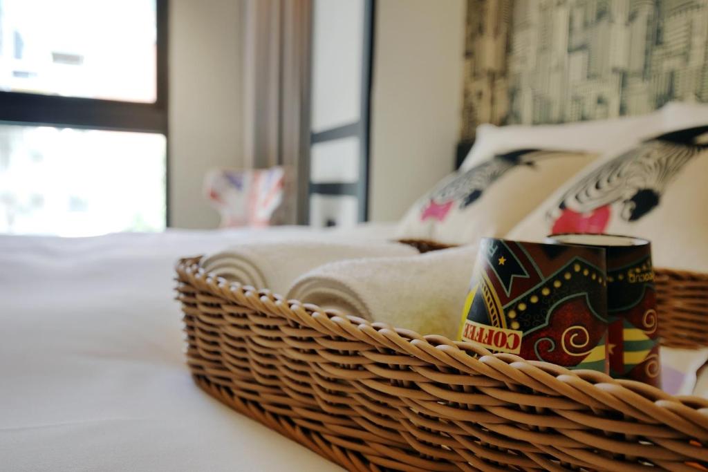 Postel nebo postele na pokoji v ubytování 默臨文旅 台中逢甲館 Morning INN