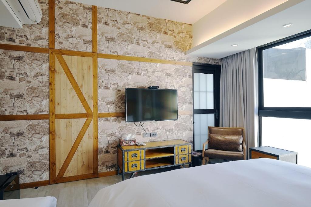 TV a/nebo společenská místnost v ubytování 默臨文旅 台中逢甲館 Morning INN