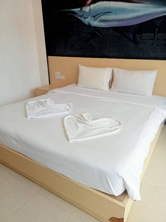 Postel nebo postele na pokoji v ubytování GO INN Aonang Beach โกอินน์ อ่าวนาง
