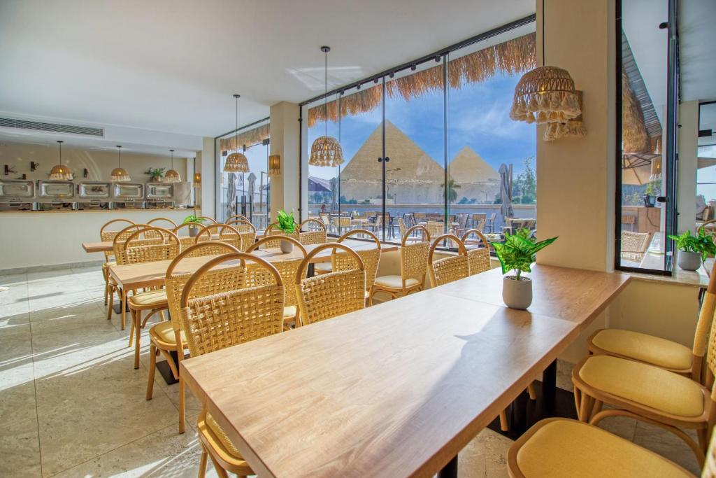 Posezení v ubytování La Boutique Hôtel - Vue Des Pyramides