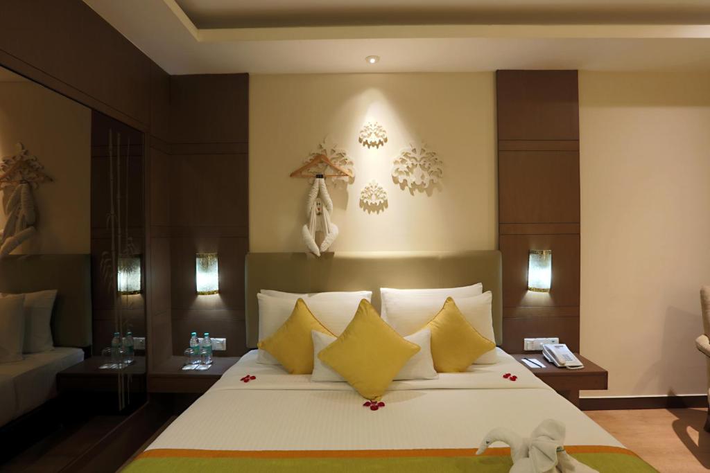 Postel nebo postele na pokoji v ubytování Hotel Aerostay IGI Delhi Airport