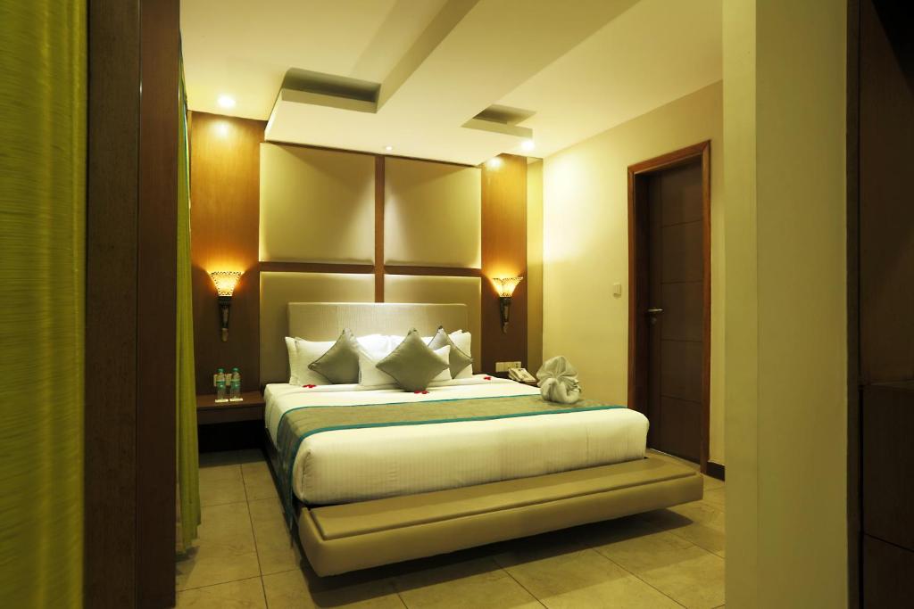 Postel nebo postele na pokoji v ubytování Hotel Aerostay IGI Delhi Airport