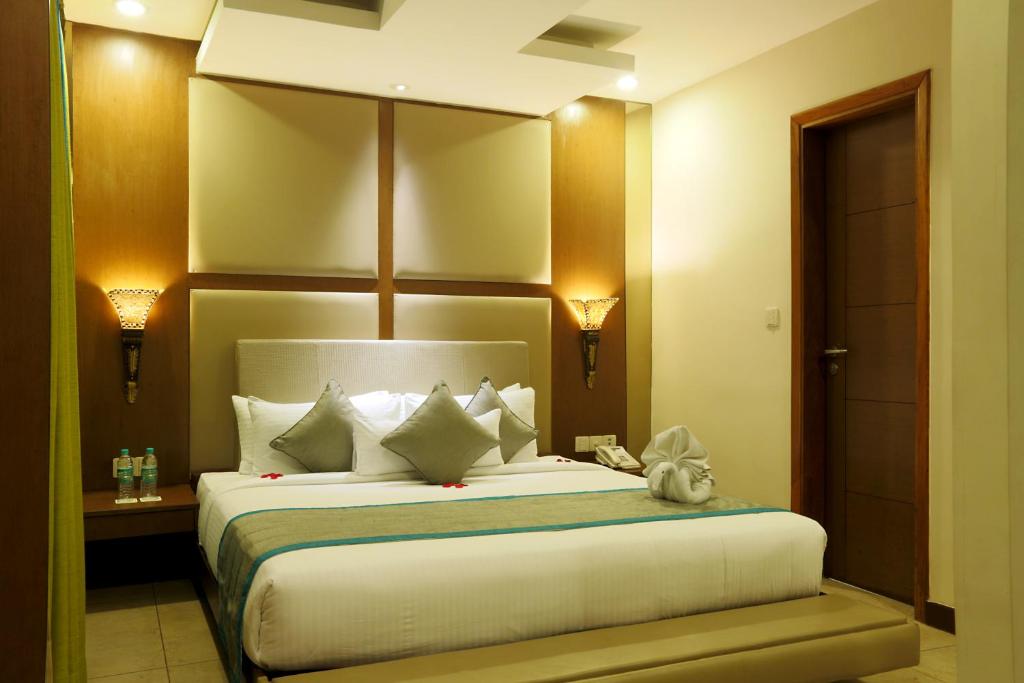 Postel nebo postele na pokoji v ubytování Hotel Aerostay IGI Delhi Airport