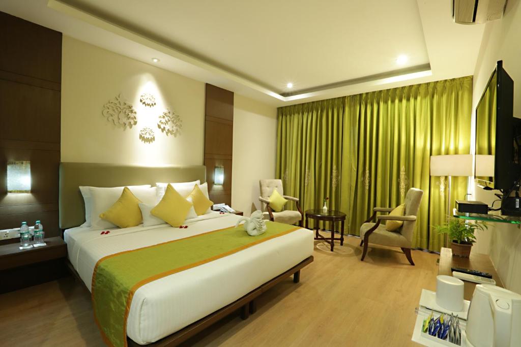 Postel nebo postele na pokoji v ubytování Hotel Aerostay IGI Delhi Airport