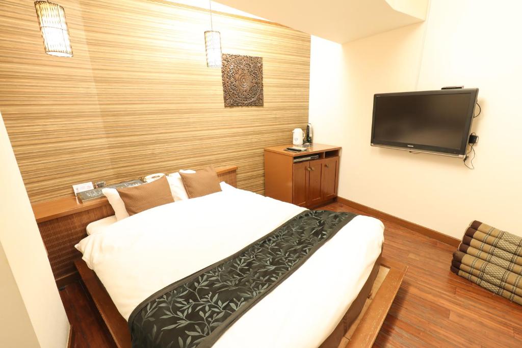 Postel nebo postele na pokoji v ubytování HOTEL B-Girl
