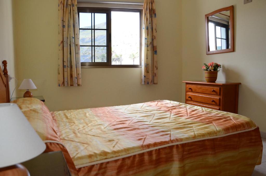 Posteľ alebo postele v izbe v ubytovaní Casa la Ermita